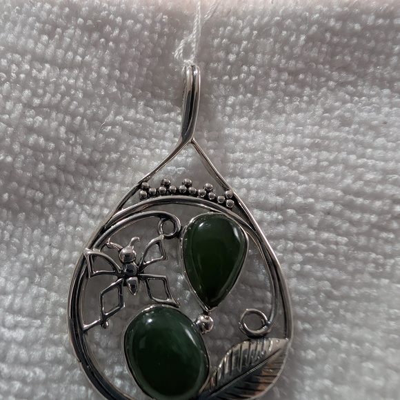 Elegant Sterling Silver and Nephrite Jade Pendant.